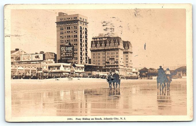 Atlantic City - View of beach pony riders bordwalk and hotels - 1920s-30s maybe