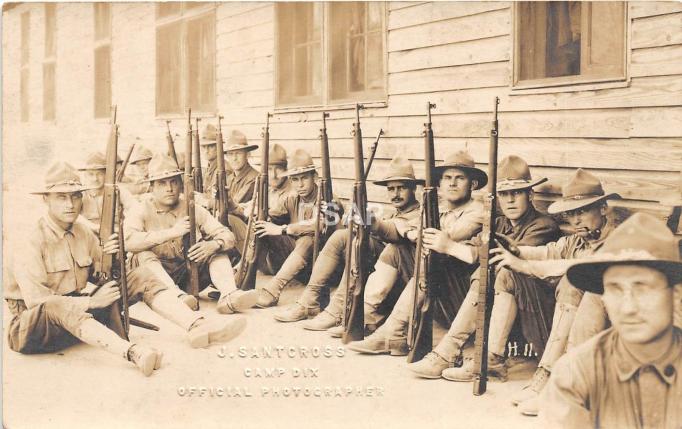 Camp Dix - soldiers seated holding rifles - c 1917 copy