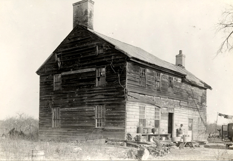 62. Frame house, brick paned, on obscure lane leading from Mount Holly-Rancocas Road (possibly a Woolman farmhouse), Westampton Twp., date unknown