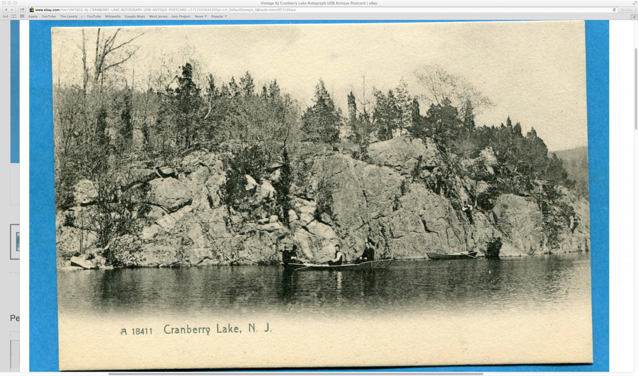 Cranberry Lake 0 A scenic view of water roch conifers and sky 0 c 1910