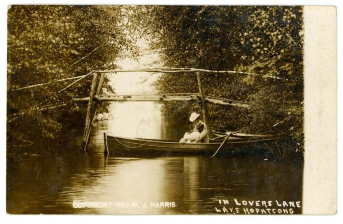Lake Hopatcong - Couple in boat in Lovers Lane  -c 1910