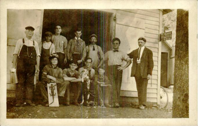 Lake Hopatcong - unidentified group standing in front of a garage or similarr structure - said to be by Harris