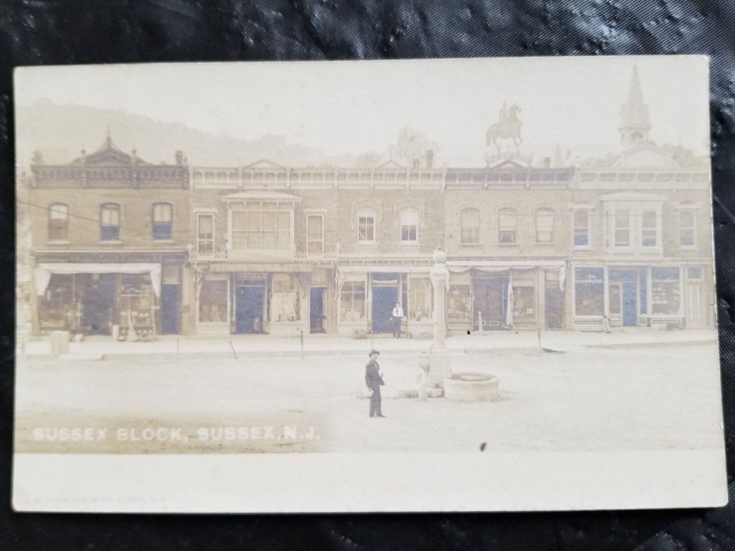 Sussex - very faded image of commercial block - c 1910