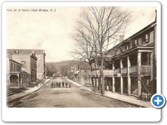 High Bridge - Main Street And Hotel - 1908 - The hotel is the balconied structure on the right.  I have no idea who the persons in the street are.