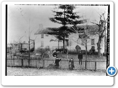 George Neuschafer - photographer - Reproduction of - EXTERIOR VIEW OF HOUSE IN 1878-81 - Mr and Mrs Joseph Williamson and two daughters in foreground - HABS - 1930s - (the note on the Photo says 1860s but the caption was likely composed after further research)