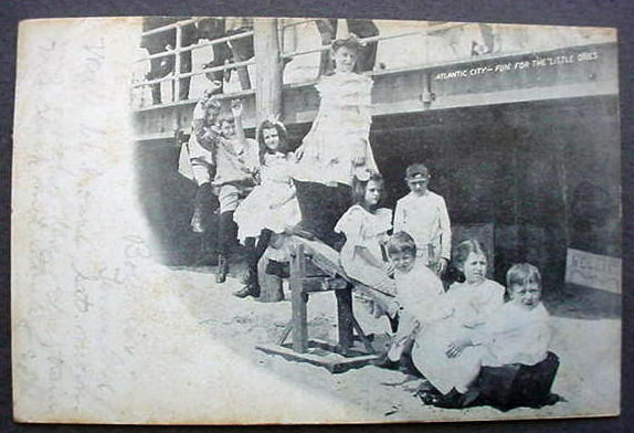 Atlantic City - Children on a see-saw on the beach by the Boardwalk - 1904