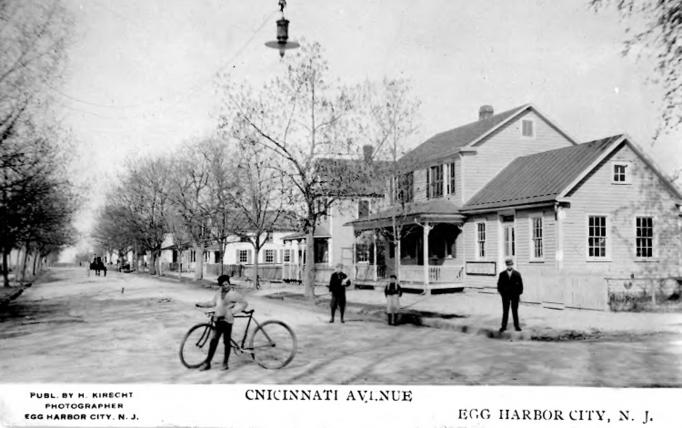 Egg Harbor City - A view from the SW corner of Cincinnati Avenue at Agassiz Street -White Horse Pike- looking east along the 100 block  - The building nearest the camera was the home of The Egg Harbor Pilot newspaper - c 1910