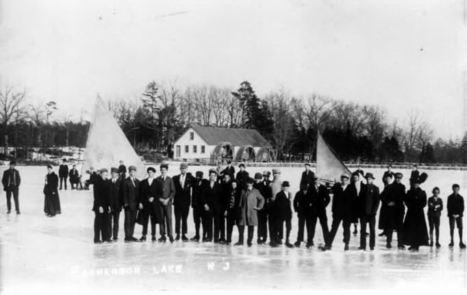 Egg Harbor City - A winter Scene on Park Lake - Note the ice boats and the old sawmill in the background