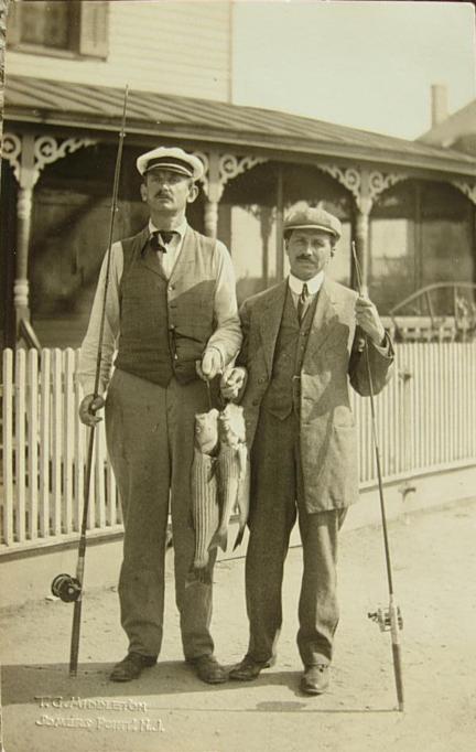 Somers Point - Two well dressed fisherman with their kit and catch - c 1910s or so