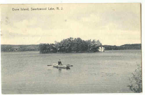 Swartswood Lake - Boater in front of Dove Island